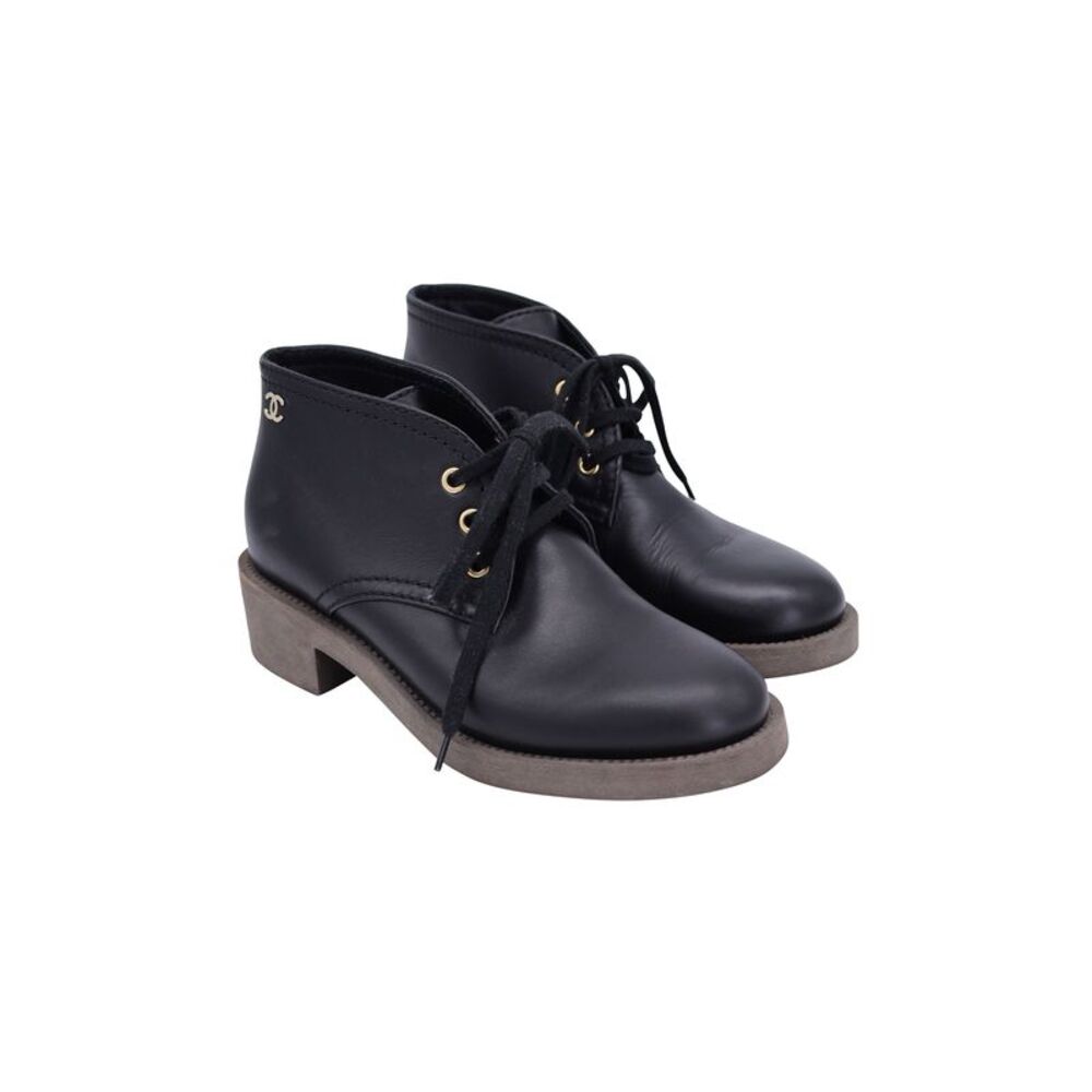 Reposhing - CHANEL Black Ankle Boots with Gold Accents - Picture 4 of 8